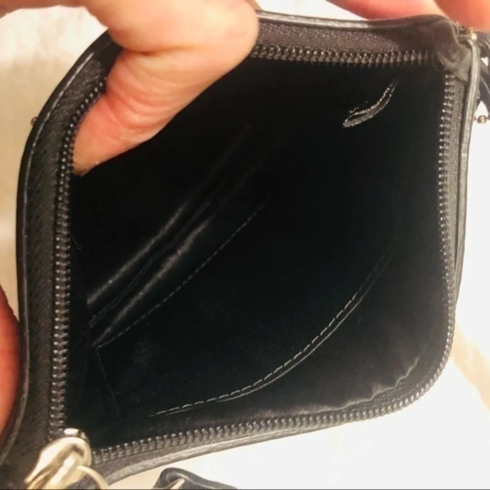 Coach signature perforated c wristlet bag